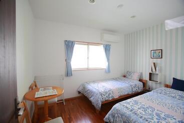 פנסיון Tanegashima Minshuku Hapisuma