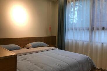 هتل Enshi Grand Canyon Chunlun Farmstay
