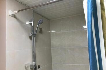 هتل Enshi Grand Canyon Chunlun Farmstay