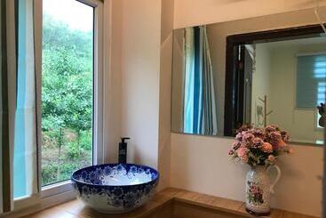 هتل Enshi Grand Canyon Chunlun Farmstay