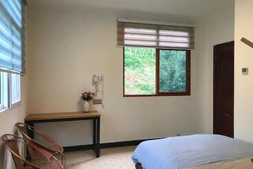 هتل Enshi Grand Canyon Chunlun Farmstay