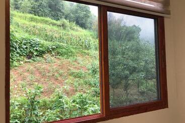هتل Enshi Grand Canyon Chunlun Farmstay
