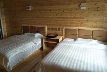 هتل Jinguan Renjia Farm Stay