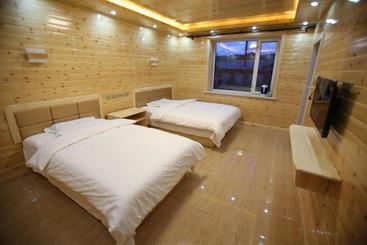 هتل Jinguan Renjia Farm Stay
