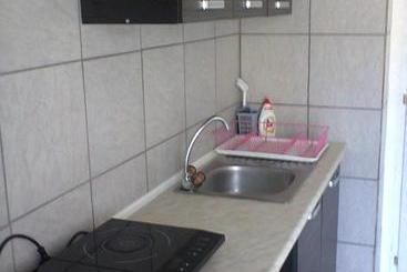 پانسیون Alpesi Apartman Downtown