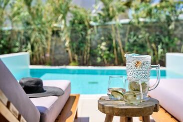 Adorno Beach Hotel And Suites