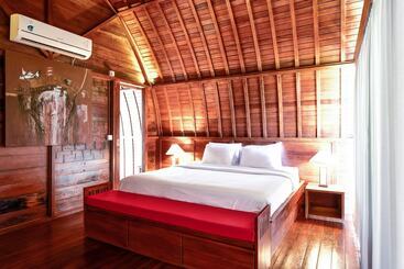 تختخواب و صبحانه The Lumbung Wood Villa