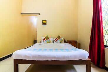 ツーリストアパートメント Mantheven Homes By Oyo Rooms