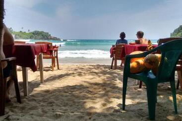 تختخواب و صبحانه Blue Beach Paradise