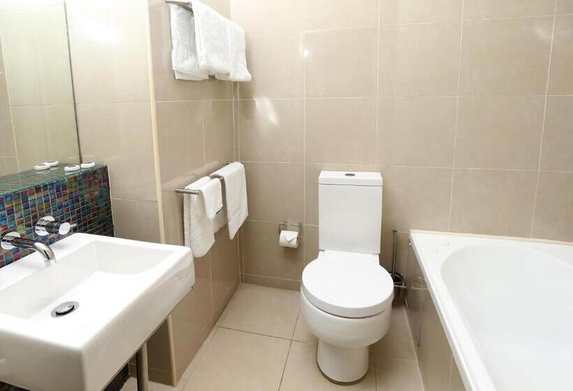 בית מלון כפרי Sandcastle Apartments