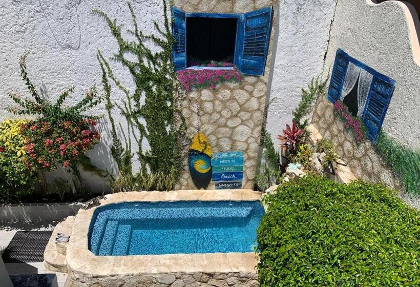 تختخواب و صبحانه Caribo Cozumel