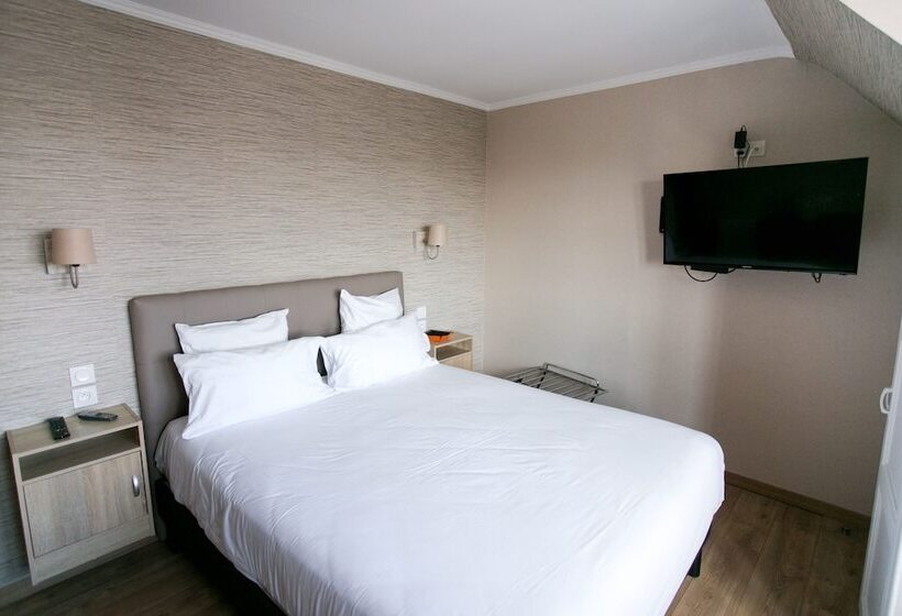Отель Le Cotentin Appart Hôtels & Restaurant Le Cot