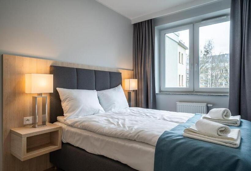 Q19 Apartments Rynek
