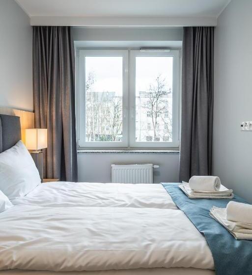 Q19 Apartments Rynek