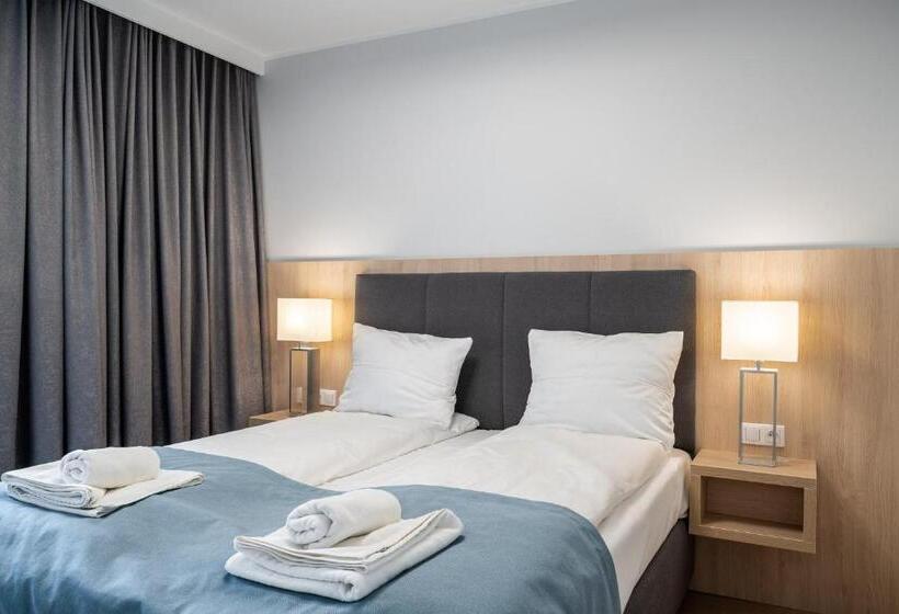 Q19 Apartments Rynek