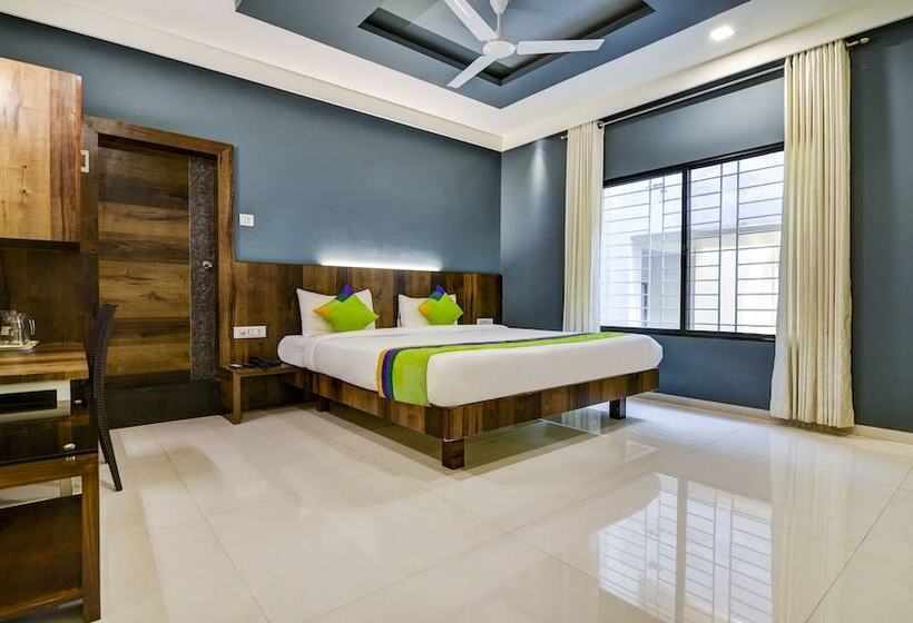 Отель Treebo Shree Sai Suites