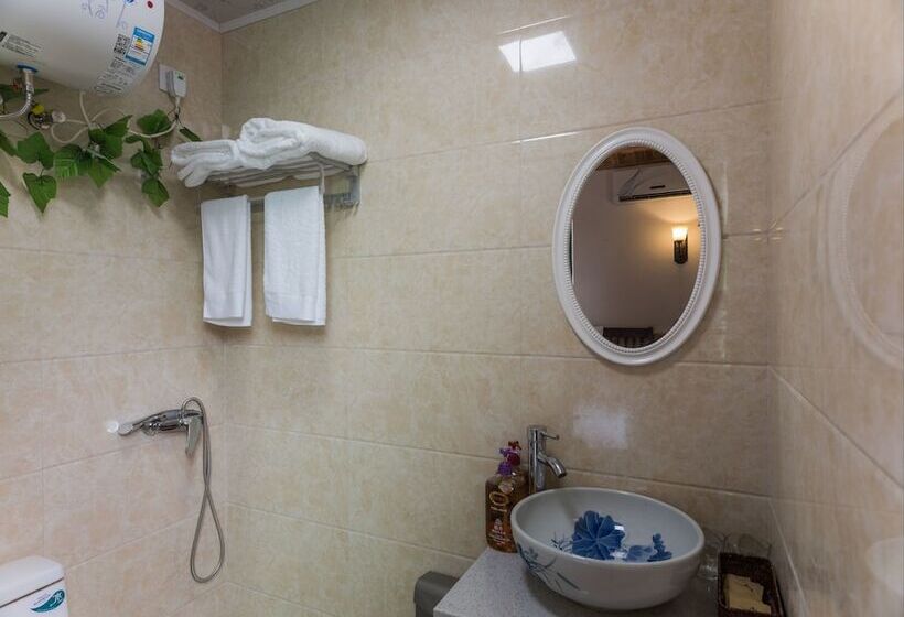 تختخواب و صبحانه Wuzhen Nanyan Muyun Homestay