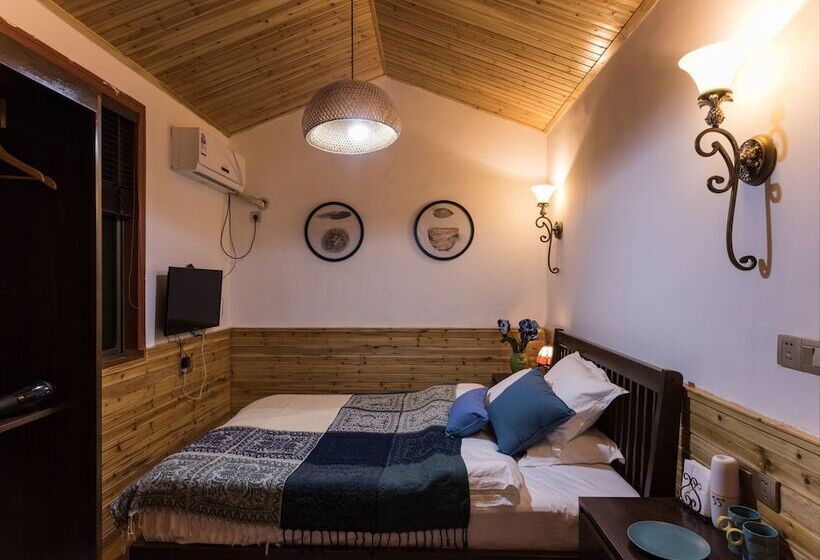 تختخواب و صبحانه Wuzhen Nanyan Muyun Homestay