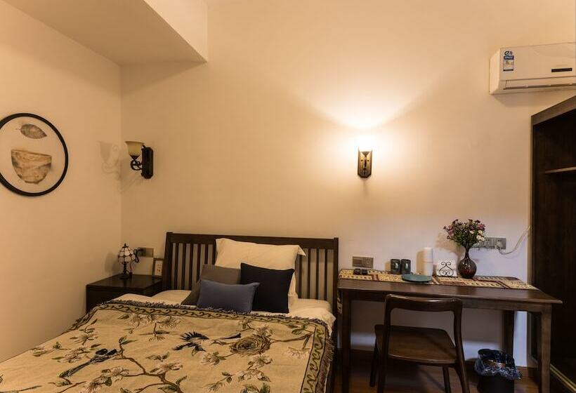 تختخواب و صبحانه Wuzhen Nanyan Muyun Homestay