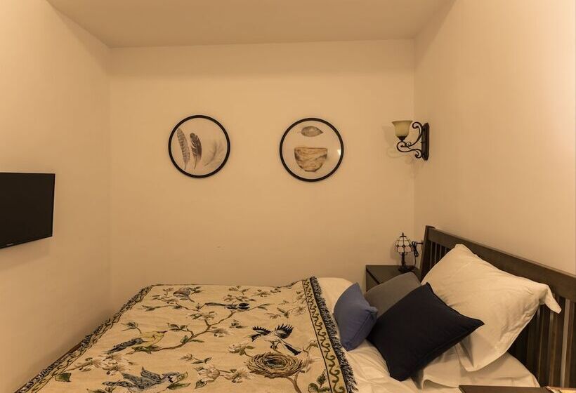 تختخواب و صبحانه Wuzhen Nanyan Muyun Homestay