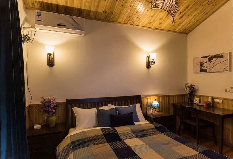 تختخواب و صبحانه Wuzhen Nanyan Muyun Homestay
