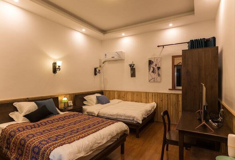 تختخواب و صبحانه Wuzhen Nanyan Muyun Homestay