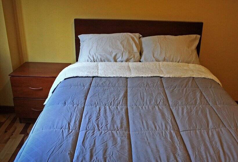 تختخواب و صبحانه El Parche Rutero Hostel