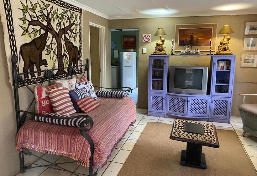 بنسيون Bohemian Garden Cottages
