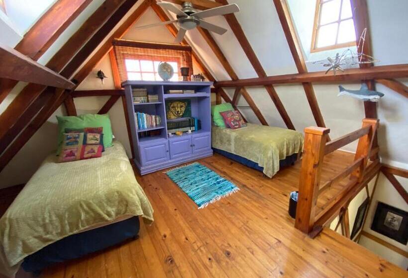 بنسيون Bohemian Garden Cottages