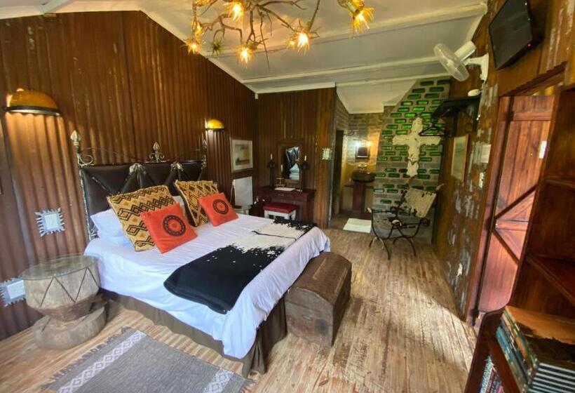 بنسيون Bohemian Garden Cottages