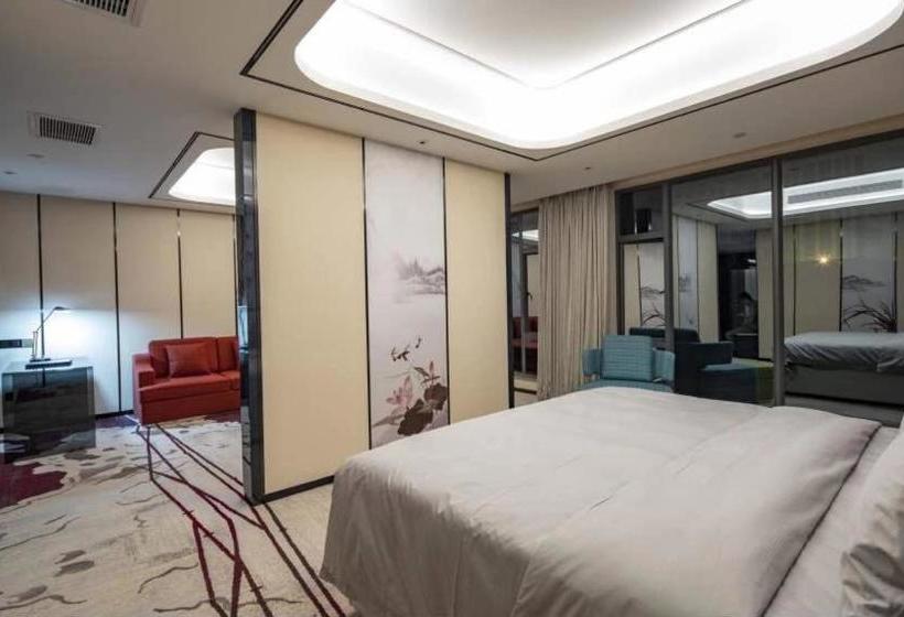 فندق Ramada By Wyndham Mengzi Suites