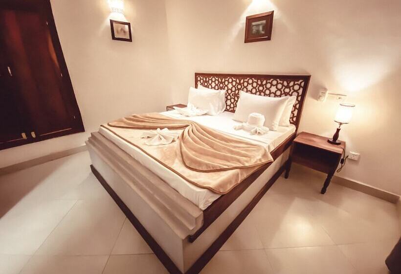 تختخواب و صبحانه Smiles Stone Town