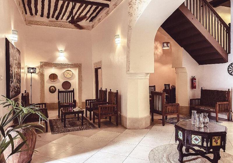 تختخواب و صبحانه Smiles Stone Town
