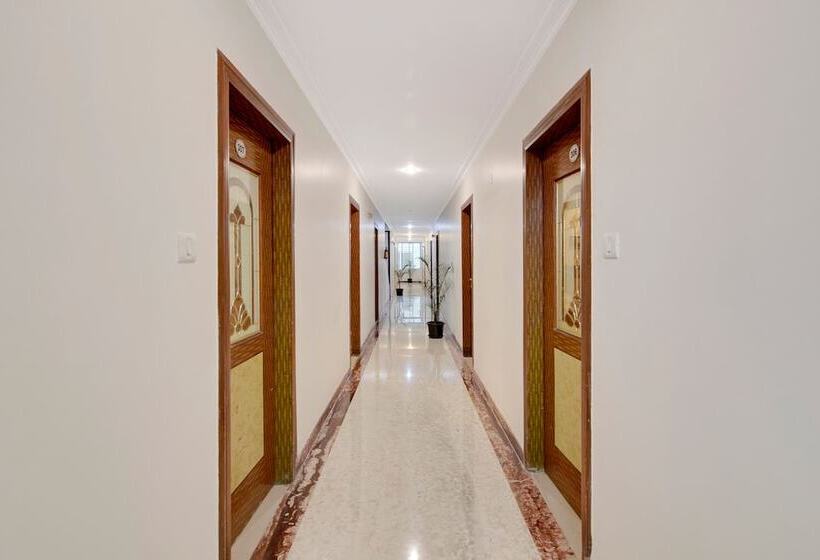Capital O Elegant Amethyst Business Hotel Near Ragigudda Sri Prasanna Anjaneyaswamy Temple