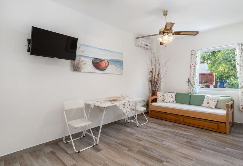 M K Apartments