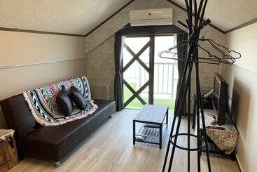 تختخواب و صبحانه Sunset Inn Churasun