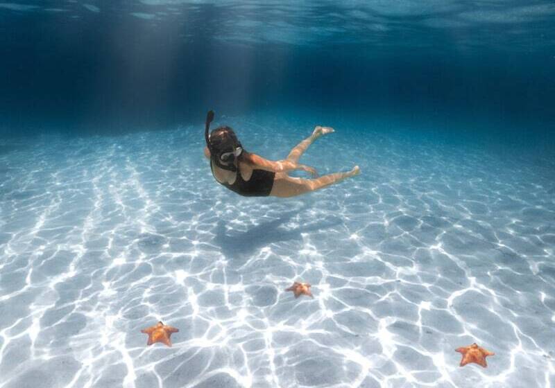 בית מלון כפרי Thatch Caye, A Muy Ono Resort