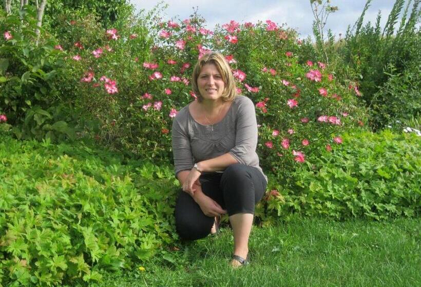 فندق Au Jardin Fleuri