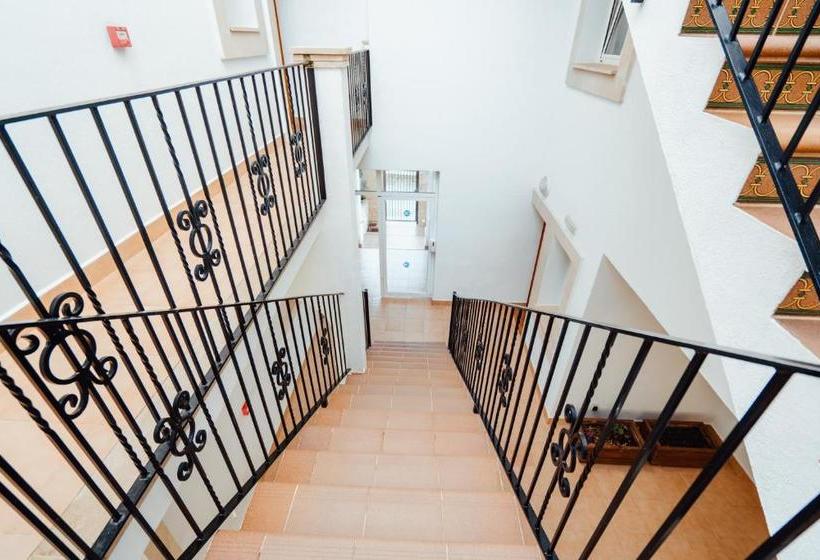 פונדק Apartamentos Punta Prima Beach