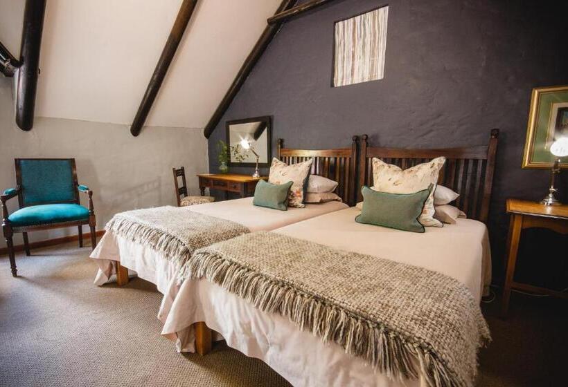 פנסיון Cypress Cottage Guest House