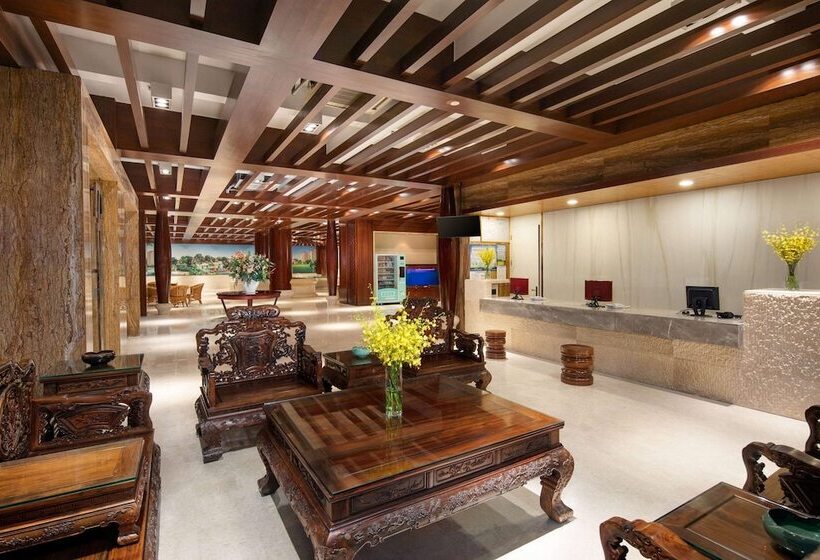 בית מלון כפרי Ramada Encore By Wyndham Qionghai Downtown