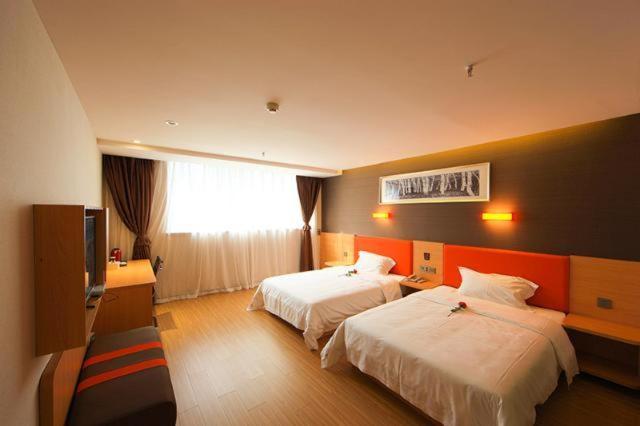 فندق 7days Premium Jingjiang Fuhai New World Bus Station