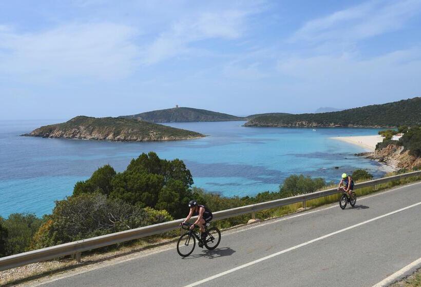 Отель Baia Di Chia Resort Sardinia, Curio Collection By Hilton