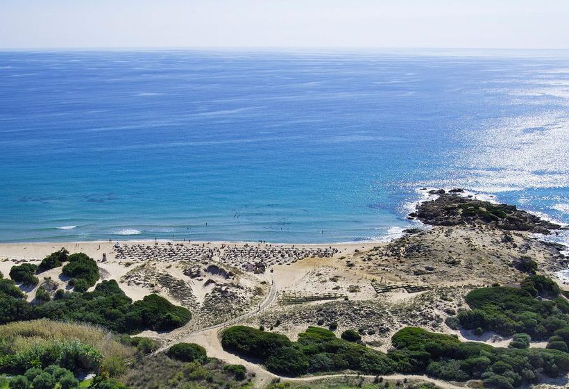 Отель Baia Di Chia Resort Sardinia, Curio Collection By Hilton