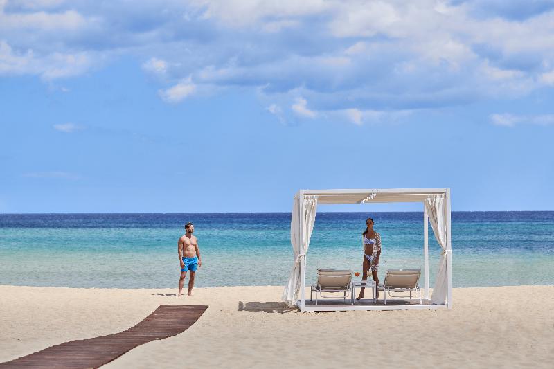 Отель Baia Di Chia Resort Sardinia, Curio Collection By Hilton