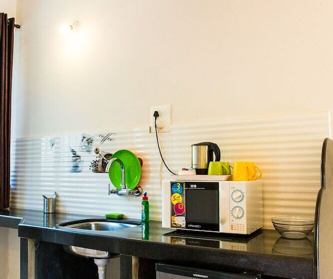 בית מלון כפרי Lazy Frog Goa