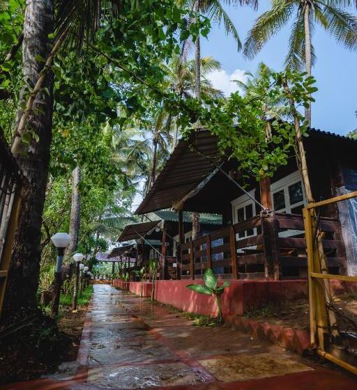 호텔 Lotusfeet Beach Resort Morjim