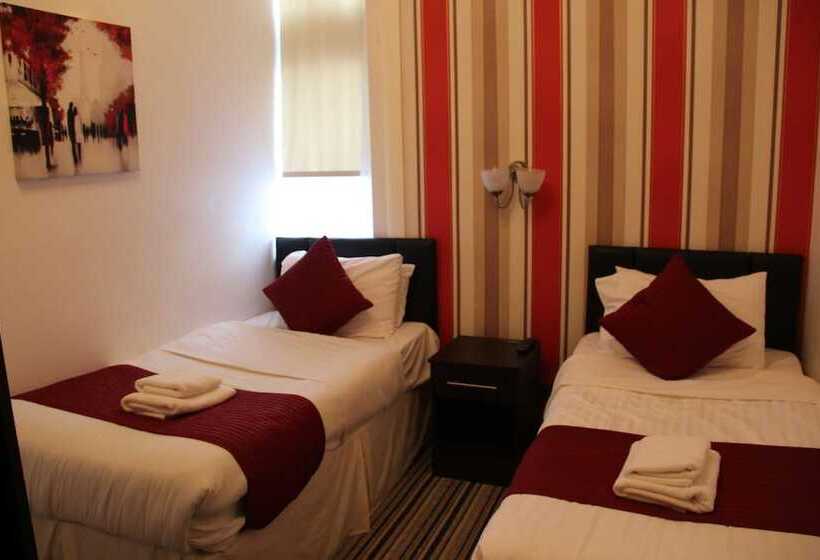 تختخواب و صبحانه The Firs Lodge