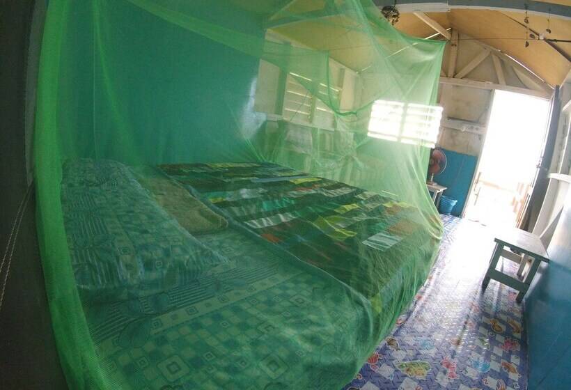 בית מלון כפרי Naga Puri Beach Retreat