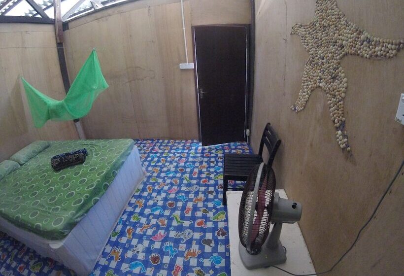 בית מלון כפרי Naga Puri Beach Retreat